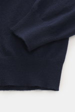 Gran Sasso Cashmere half-zip jumper navy shown from a close-up side angle, highlighting elastic rib cuffs and fine knit pattern.