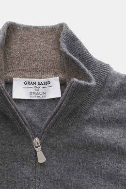 Close-up front view of the Gran Sasso Cashmere half-zip jumper dark grey melange showing the zipper stand-up collar, fine knit pattern, and soft texture. There are basics that simply should not be missing from any elegant wardrobe - like this timeless hal