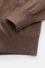 Gran Sasso Cashmere half-zip jumper dark grey melange shown in close-up from above, highlighting elastic rib cuffs and fine knit pattern.