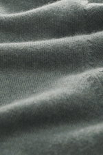 Close-up front view of the Gran Sasso Cashmere half-zip jumper grey green melange showing fine knit pattern, soft touch pure cashmere fabric with elastic rib cuffs and zipper stand-up collar in slim fit.