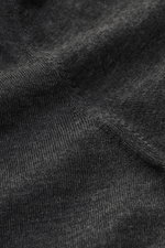 Close-up front view of Gran Sasso Fine knit polo dark grey fabric showing ultra-fine knit texture and smooth, lightweight quality.