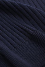 Close-up, angled view of Brunello Cucinelli Cashmere knitted polo navy showing wide rib knit texture and soft pure cashmere fabric.

<p>Timeless essential for the refined men's wardrobe: BRUNELLO CUCINELLI has chosen pure cashmere in wide rib knit for thi