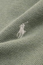 Close-up front view of Polo Ralph Lauren Half-zip jumper mint green showing medium-fine knit texture and tonal polo player stitching on chest, made of pure cotton with a slightly robust touch and comfortable ribbed bands. 

<p>A essential for mild days: T