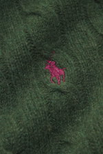 Close-up front view of Polo Ralph Lauren Troyer dark green cable knit with tonal polo player stitching, wool and cashmere blend.

Description: <p>An essential for cool days: This Troyer by POLO RALPH LAUREN impresses with high-quality cable knit made from