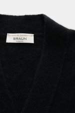 Close-up front view of the Filippo de Laurentiis Cardigan black, showing soft texture and label. <p>A soft, luxurious blend of cashmere, silk and high-quality microfibre makes this cardigan by FILIPPO DE LAURENTIIS your new favourite for modern layering l