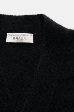 Close-up front view of the Filippo de Laurentiis Cardigan black, showing soft texture and label. <p>A soft, luxurious blend of cashmere, silk and high-quality microfibre makes this cardigan by FILIPPO DE LAURENTIIS your new favourite for modern layering l
