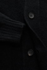 Close-up front view of the Filippo de Laurentiis Cardigan black showing medium-fine knit, five-button placket, and elasticated rib knit cuff.

<p>A soft, luxurious blend of cashmere, silk and high-quality microfibre makes this cardigan by FILIPPO DE LAURE