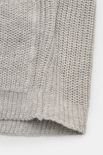 Close-up front view of Iris von Arnim Cardigan 'Larion' grey mottled showing voluminous brioche knit in linen-cotton blend.

Description:  
A luxurious knitwear essential: With its voluminous brioche knit in the finest linen-cotton blend, this cardigan by