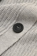 Close-up front view of Iris von Arnim Cardigan 'Larion' grey mottled showing voluminous brioche knit, rib collar, and black button.

<p>A luxurious knitwear essential: With its voluminous brioche knit in the finest linen-cotton blend, this cardigan by IRI