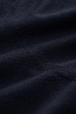 Close-up front view of the fine knit texture and stitching of the BRAUN Hamburg Cardigan navy, showcasing luxury fabric blend.

Description: <p>Luxury you can feel on your skin, in a timeless and elegant design: This fine knit cardigan by BRAUN HAMBURG is
