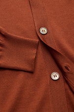 Close-up front view of the BRAUN Hamburg Cardigan rust brown, showing fine knit, slim fit, V-neck, five-button placket, and ribbed bands.

<p>Luxury you can feel on your skin, in a timeless and elegant design: This fine knit cardigan by BRAUN HAMBURG is d