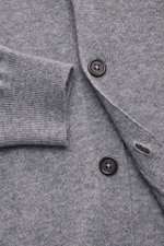 Close-up front view of the von Braun Cashmere Cardigan grau meliert showing soft, fine-knit grey melange fabric, five-button placket, and elastic ribbed cuffs. Basic for transitional seasons made from pure Mongolian cashmere with a soft feel and slim fit,