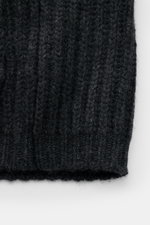 Close-up front view of the von Braun Cashmere cardigan anthracite mottled showing chunky brioche stitch knit and ribbed hem. 

Description: 
<p>How about a less chunky knit? This cardigan in brioche stitch from the VON BRAUN Cashmere collection is your be