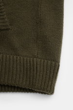 Close-up front view of the von Braun Cashmere cardigan olive showing medium-fine knit, ribbed bands, and slanted hip pocket.

Description: <p>Maximum comfort with the highest standards: This cardigan from the VON BRAUN Cashmere collection is made of pure,