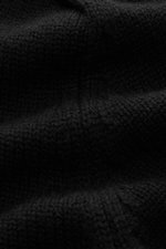 Close-up front view of von Braun Cashmere cardigan black showing medium-fine knit texture and soft feel of pure Mongolian cashmere fabric.

<p>Maximum comfort with the highest standards: This cardigan from the VON BRAUN Cashmere collection is made of pure