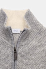 Close-up front view of von Braun Cashmere cardigan grey mottled showing textured knit, high collar, and two-way zip with leather pull.

<p>Maximum comfort with the highest standards: This cardigan in a textured knit from VON BRAUN’s cashmere collection is