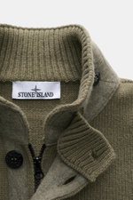 Close-up front view of Stone Island Cardigan 'Lambswool' olive showing the standing collar with ribbed knit texture, embossed buttons, robust two-way zip, and felt details. A stylish essential for cool days: this casual cardigan by STONE ISLAND in a warm 
