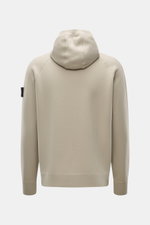 Stone Island Strickjacke 'Stretchwool' sand in Rückansicht, Kapuze, Raglan-Ärmel, Kompass-Badge, weicher Wollmix, Rippbündchen.