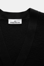 Close-up front view of Stone Island Cardigan black showing pure virgin wool texture, ribbed collar, and brand label.

Description: <p>Comfortable essential: The cardigan from STONE ISLAND made of pure virgin wool impresses with warming comfort and is a ve