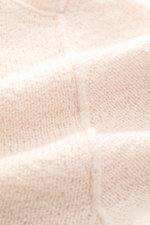 Close-up front view of Stone Island Cardigan cream in pure virgin wool showing soft touch knit texture and ribbed details.

Description: 
<p>Comfortable essential: The cardigan from STONE ISLAND made of pure virgin wool impresses with warming comfort and 