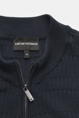 Close-up front view of Emporio Armani Cardigan navy showing ribbed stand-up collar, two-way zipper with logo, and textured fine knit pattern.