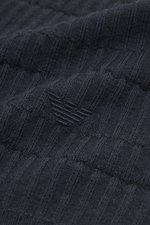 Close-up front-left angled view of the Emporio Armani Cardigan navy in pure virgin wool, showing its fine textured knit, ribbed collar, cuffs, two-way zipper, and logo stitching on the hem, highlighting the soft touch and regular fit.