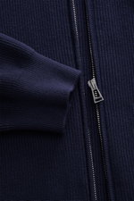 Close-up front view of Belstaff Cardigan 'Commander' navy showing pure cotton fabric with slightly textured quality, fine rib stitch pattern, flat knit details, slim fit, concealed metal zipper, ribbed stand-up collar, BELSTAFF woven label on upper arm, a