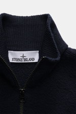 Close-up front view of the Stone Island Cardigan navy showing its high collar, two-way zipper, and textured pure virgin wool fabric.

Description: <p>Comfortable essential: The cardigan from STONE ISLAND made of pure virgin wool impresses with a sporty lo