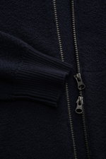 Close-up front view of Stone Island Cardigan navy showing pure virgin wool texture, two-way zipper, and ribbed cuff.

Description: <p>Comfortable essential: The cardigan from STONE ISLAND made of pure virgin wool impresses with a sporty look and warming w