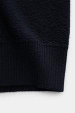 Close-up front view of Stone Island Cardigan navy showing pure virgin wool texture and ribbed cuff details.

Additional description:
<p>Comfortable essential: The cardigan from STONE ISLAND made of pure virgin wool impresses with a sporty look and warming