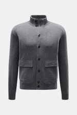 Fioroni Cashmere cardigan dark grey melange shown from the front, featuring pure cashmere, soft touch, fine knit pattern, regular fit, smooth button placket with leather, ribbed stand-up collar, patch pockets, and ribbed cuffs. Luxurious cashmere for cold