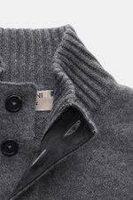 Close-up front view of the Fioroni Cashmere cardigan dark grey melange showing ribbed stand-up collar, leather-reinforced button placket, and fine knit pattern.

Description: 
<p>Luxurious cashmere for cold days: With its particularly pleasant, warming ma