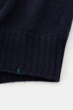 Close-up front view of the Fioroni Cashmere cardigan navy sleeve showing fine knit pattern and ribbed cuff detail.

<p>Luxurious cashmere for cold days: With its particularly pleasant, warming material, the timeless cardigan from FIORONI stylishly gets yo