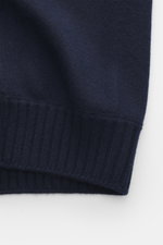 Close-up front perspective of the Gran Sasso Cashmere cardigan navy showing pure cashmere, soft touch, fine knit pattern, regular fit, rib-knit stand-up collar, and two-way zipper.
