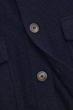 Close-up front view of navy Gran Sasso Cashmere Cardigan showing eight buttons, patch hip pockets with flap, and fine knit.

<p>The luxuriously soft cardigan by GRAN SASSO is made from the finest cashmere – a timeless essential that adds a stylish touch t