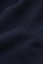 Gran Sasso Cashmere cardigan navy close-up from a front angle showing pure cashmere, soft feel, medium fine knit pattern, regular fit, ribbed stand-up collar, two-way zipper.