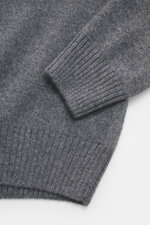 Close-up front view of Gran Sasso Cashmere cardigan dark grey melange sleeve, showing pure cashmere, soft touch, medium-fine knit, regular fit, ribbed stand-up collar, and two-way zipper.