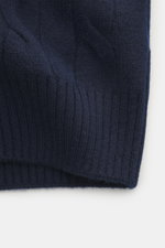 Close-up front view of Gran Sasso Cashmere cardigan off-white showing soft cable knit texture and elastic rib cuffs.