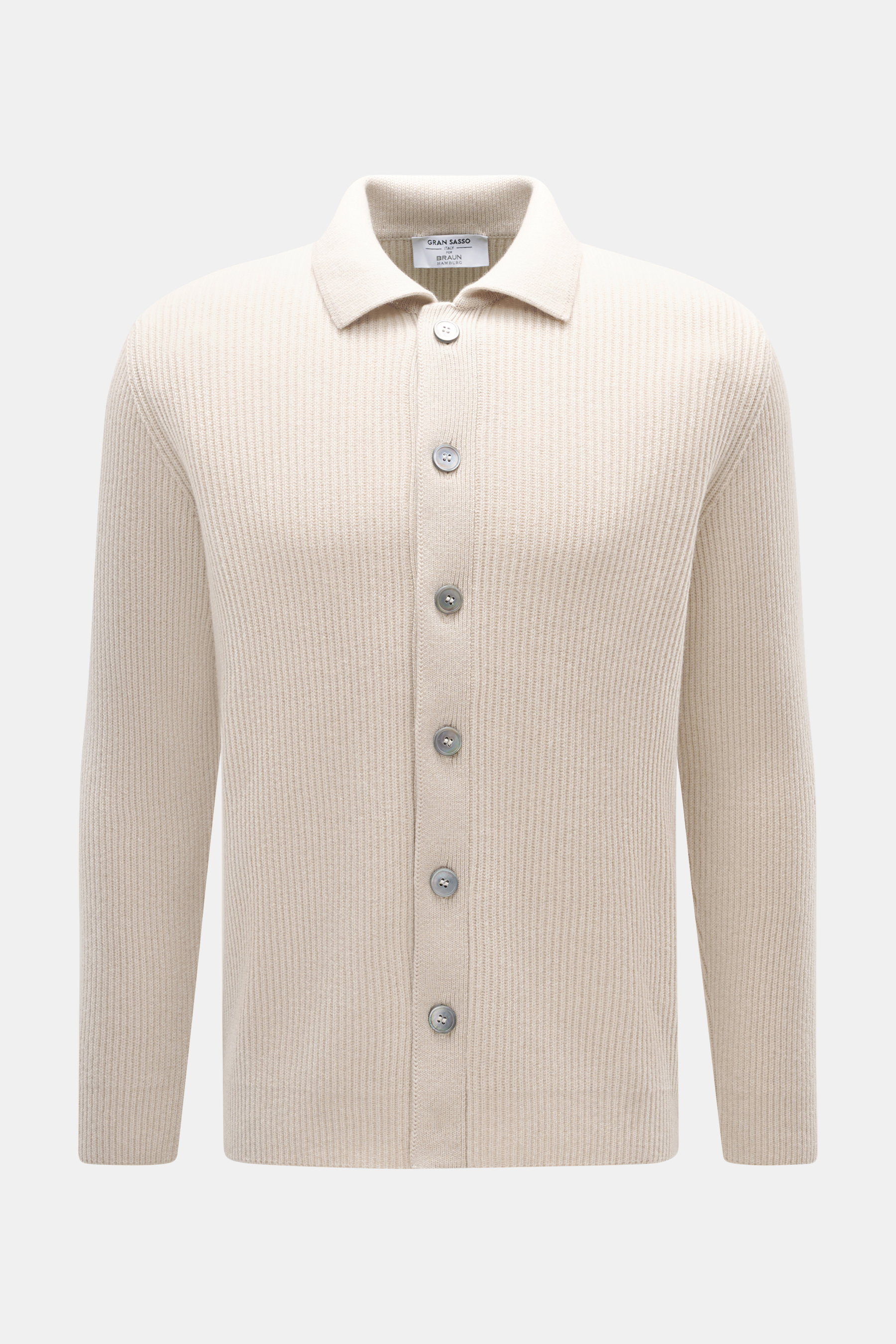 Front view of Gran Sasso Cashmere Cardigan sand in a heavy rib knit with turn-down collar and six mother-of-pearl buttons.

<p>The luxurious cardigan by GRAN SASSO is made from finest cashmere in a heavy rib knit - a timeless essential that gives any casu