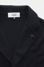 Close-up front view of the Lardini Knitted Blazer Navy collar and lapel, showing fine knit wool texture and flower pin.

Description: 
<p>With a classic silhouette and made from pure wool, the knitted blazer by LARDINI brings style and personality to your