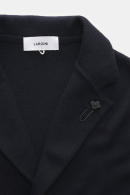 Close-up front view of the Lardini Knitted Blazer Navy collar and lapel, showing fine knit wool texture and flower pin.

Description: 
<p>With a classic silhouette and made from pure wool, the knitted blazer by LARDINI brings style and personality to your