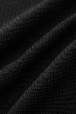 Alt tag (125 characters max):
Close-up of black knit fabric texture, highlighting fine knit pattern of Lardini Knitted blazer black in soft pure wool.

Additional description:
<p>With a classic silhouette and made from pure wool, the LARDINI knitted blaze