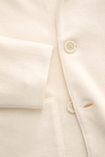 Close-up front view of Lardini Knitted blazer cream showing fine knit pattern, button, and cuff detail in pure wool.

Description: <p>With a classic silhouette and made from pure wool, the stylish knitted blazer by LARDINI perfects your smart casual wardr