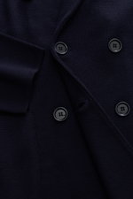 Lardini Knitted blazer navy close-up front view showing double-breasted buttons, fine pure wool knit, soft touch, slim fit, lapel with flower pin.