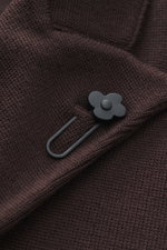 Close-up front view of Lardini Knitted blazer dark brown showing fine knit pure wool fabric and black flower lapel pin.

With a classic silhouette and made from pure wool, the stylish knitted blazer by LARDINI perfects your smart casual wardrobe.
- knit f