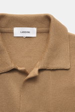 Close-up front view of Lardini Cardigan light brown in pure new wool with soft feel, fine knit pattern, slim fit, four-button placket, open collar, patch chest and hip pockets.