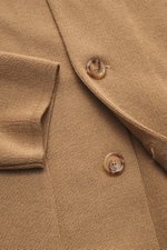 Close-up front top-down view of Lardini Cardigan light brown showing fine knit pattern in pure new wool, soft feel, slim fit, four-button placket, open collar, patch chest pocket, and patch hip pockets.