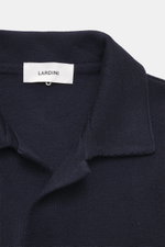 Close-up front view of Lardini Cardigan navy showing open collar in pure new wool with soft feel, fine knit pattern, slim fit, four-button placket, patch chest and hip pockets.