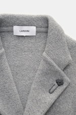Close-up front view of Lardini Cashmere knit blazer grey melange showing fine pure cashmere knit, step lapel with flower pin, soft texture, and label.

Description: <p>Exquisite knit blazer from LARDINI: This model in smooth, fine pure cashmere knit adds 