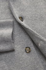Close-up front view of Lardini Cashmere knit blazer grey melange in fine pure cashmere with button, cuff, and lapel details.

Description: 
<p>Exquisite knit blazer from LARDINI: This model in smooth, fine pure cashmere knit adds warmth and style to your 